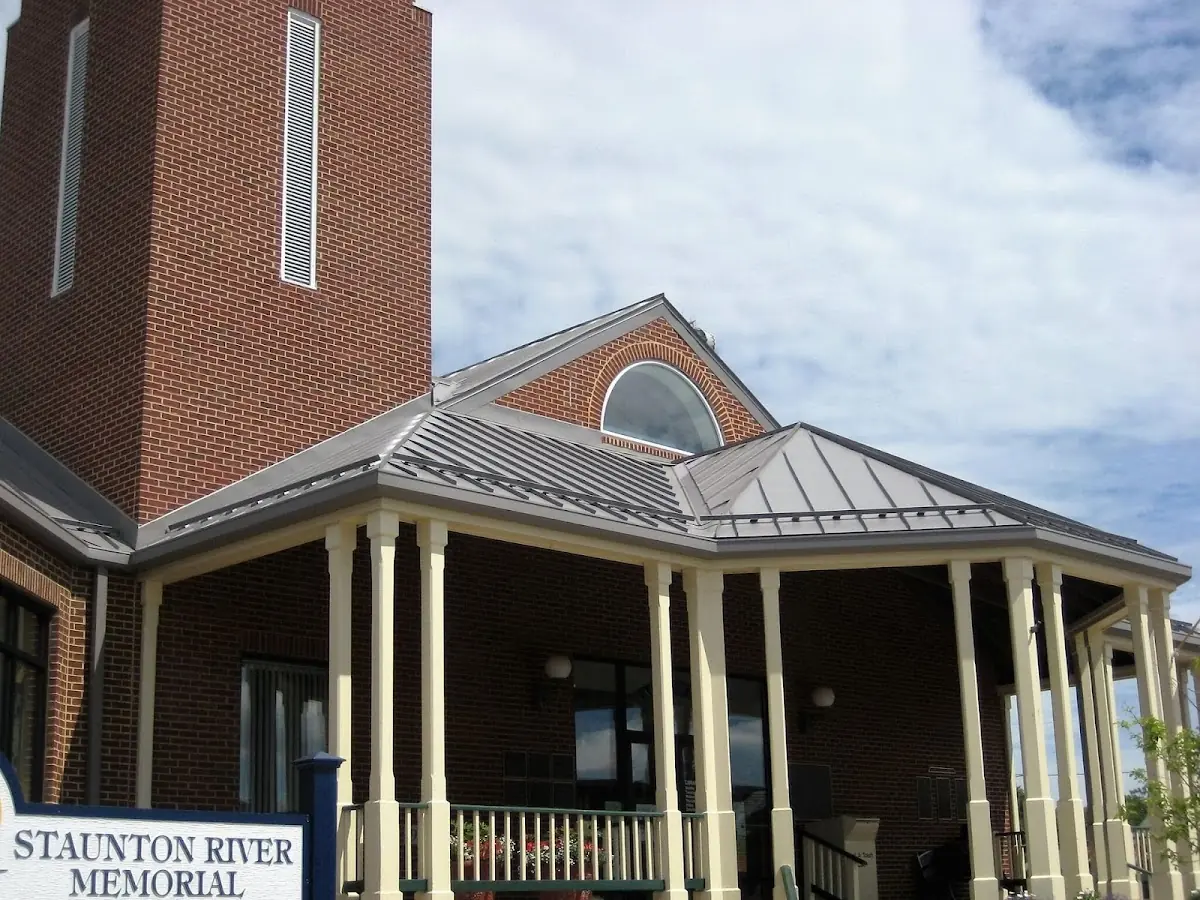Skilled roofing craftsmen working on a residential roof in Mount Bethel